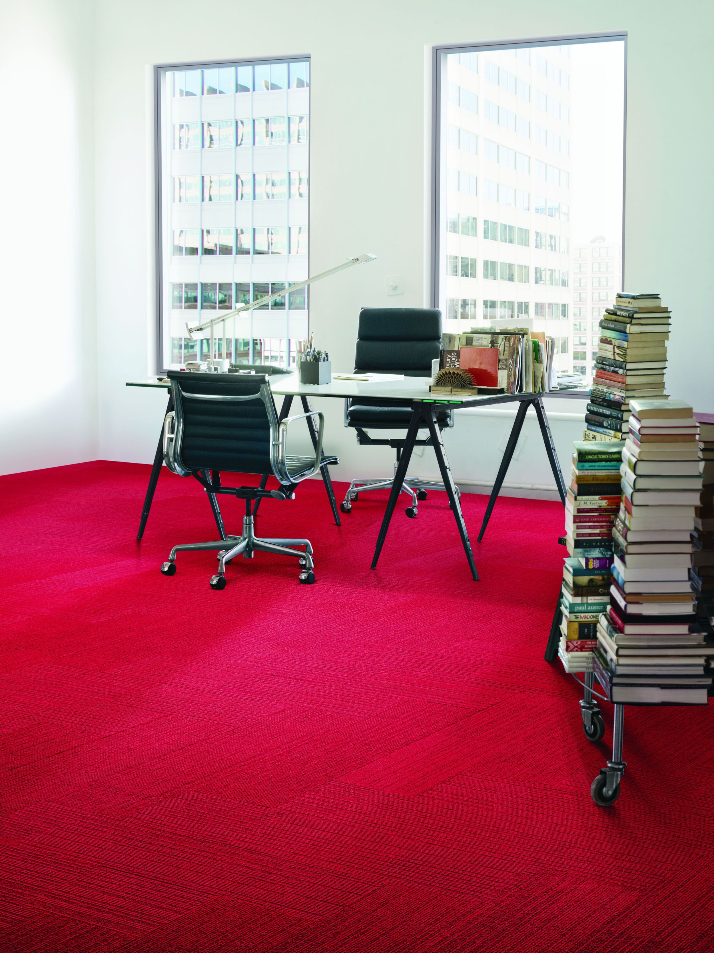 Interface On Line plank carpet tile in space with desk and stacks of books against wall número de imagen 5